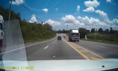 Pickup cornering too fast loses control 