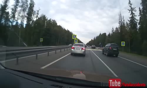 Pedestrian crossing on a busy highway 