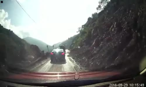 Car crushed by tanker truck in China 