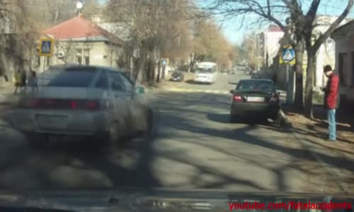 Four people waiting to cross the road are ran over after car accident 