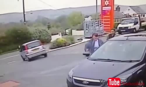 Elderly Woman Driver Exits Petrol Station 