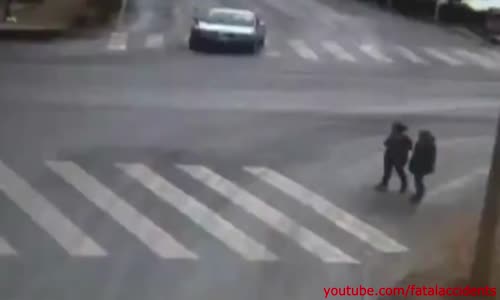 Ambulance Causes Freak Accident - Nearly Kills Two Pedestrians 