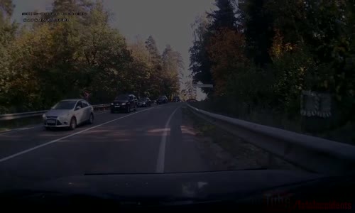 Car drives straight into oncoming truck 