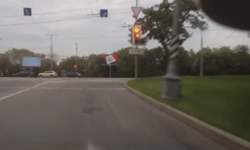 Biker gets slammed hard against the curb 