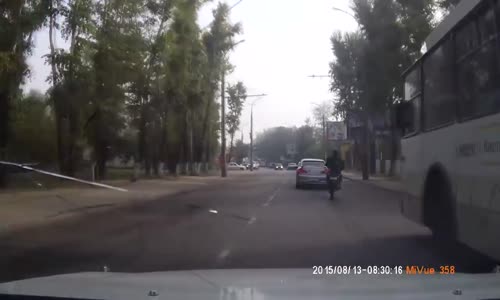 Motorcyclist panic braking hard 