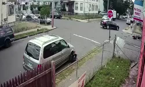 Guy on scooter blows a stop sign 