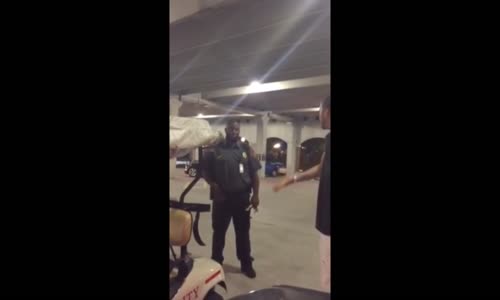 Security guard firing shots in parking garage 