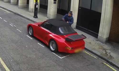 Man Desperately Tries To Steal Porsche 