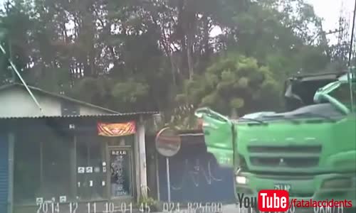 Out of control truck slams into house 