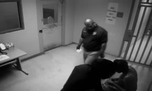 New Video Showing Sandra Bland During The Intake Process Using Phone 