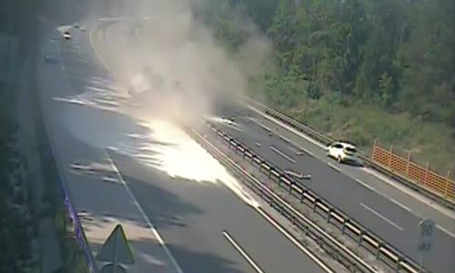 Semi truck's tire explodes driving on highway 