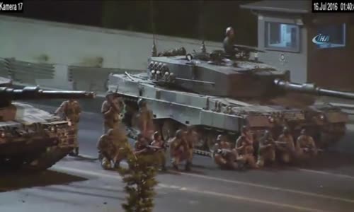 Tanks and soldiers firing at protestors 