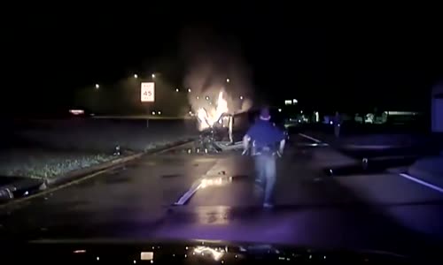 Police Officers Pull Man From Burning Car 