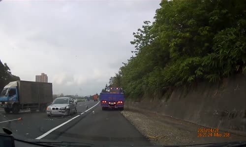BMW slams on the brakes in front of a truck 